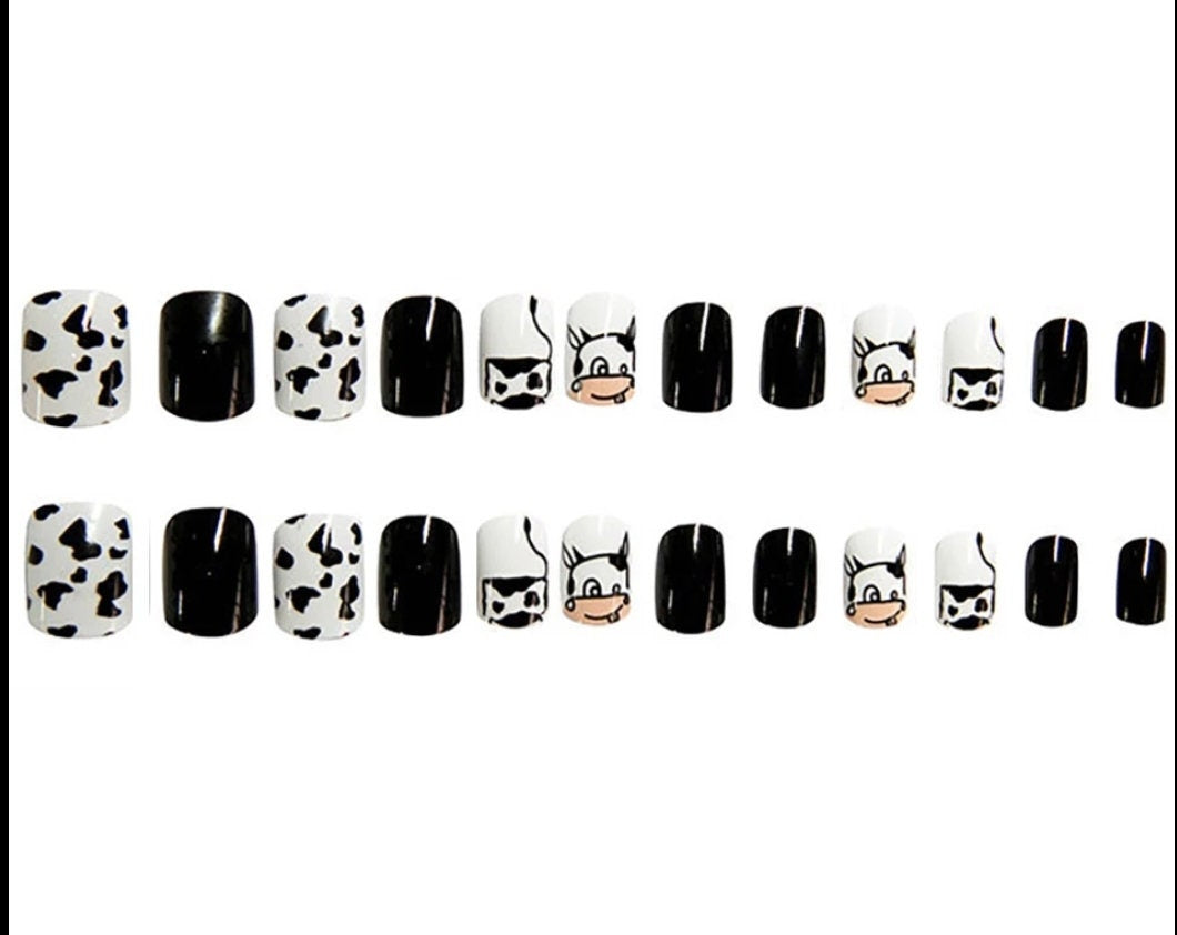 24-piece short press-on nails with black and white cow print in square cartoon kawaii design surethings