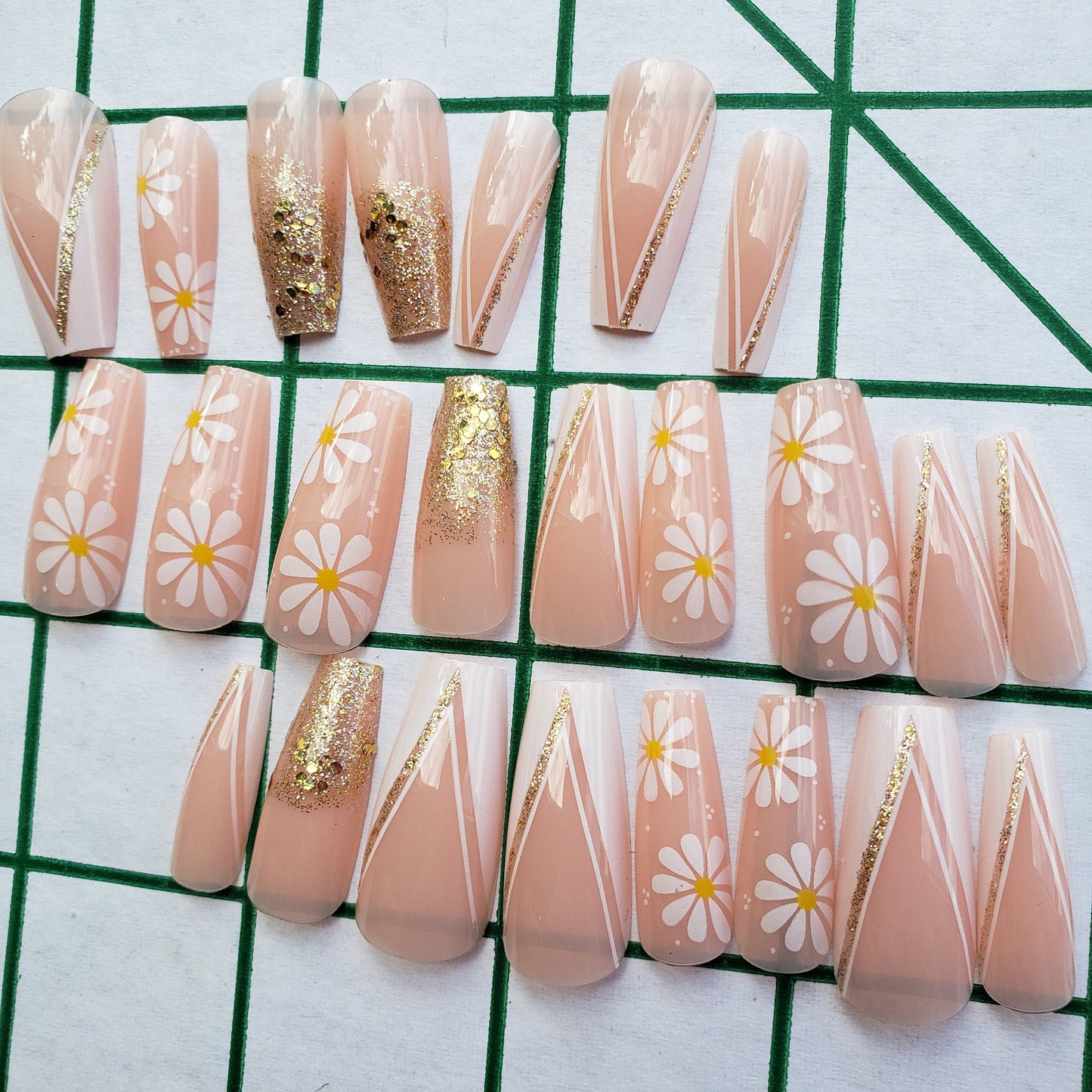 Long press on nails with sunflower design, nude and gold glitter, coffin French tip – 24 glue-on set surethigs