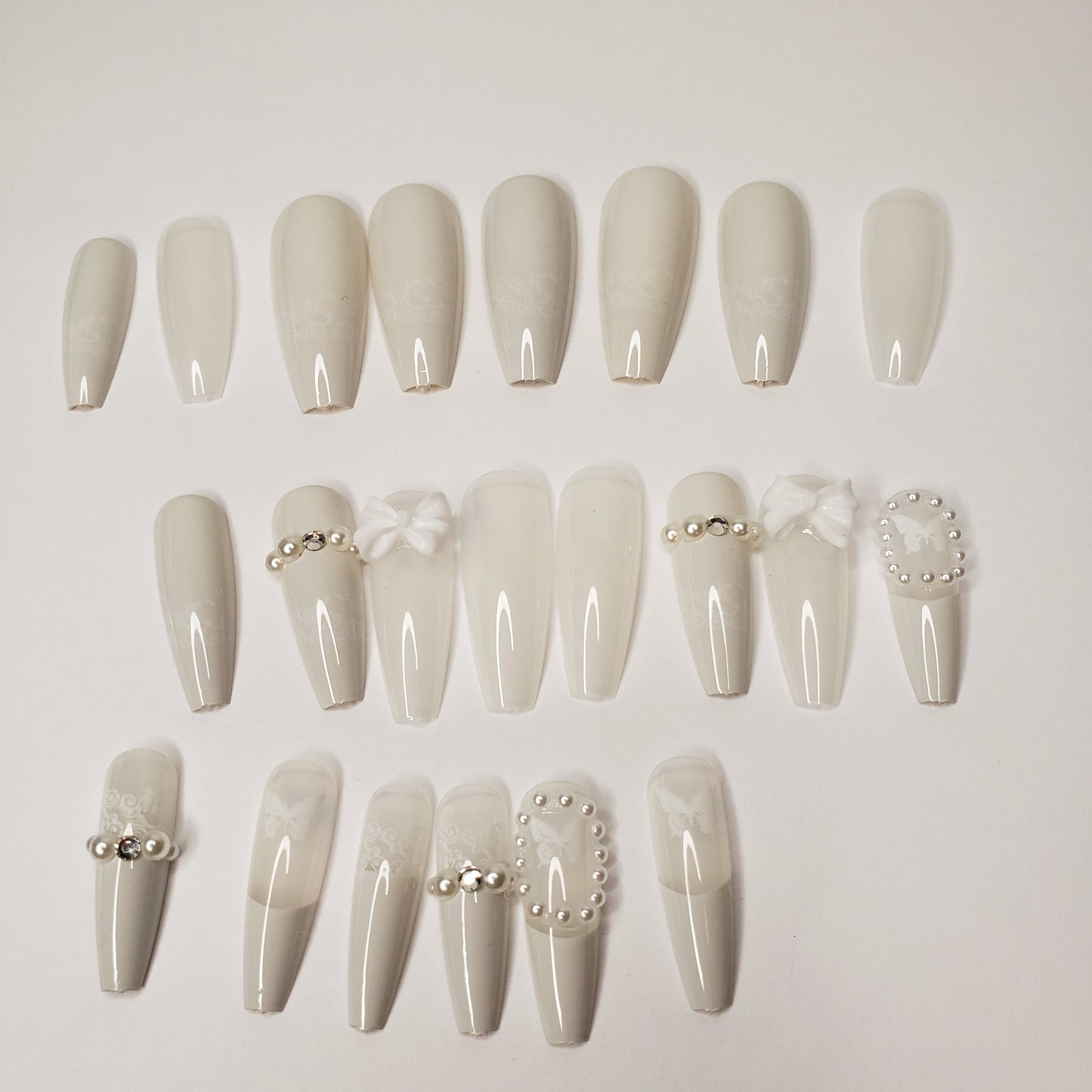 24 off-white wedding long press-on nails in coffin shape with bow, lace, and gem details – elegant glue-on nail set surethings