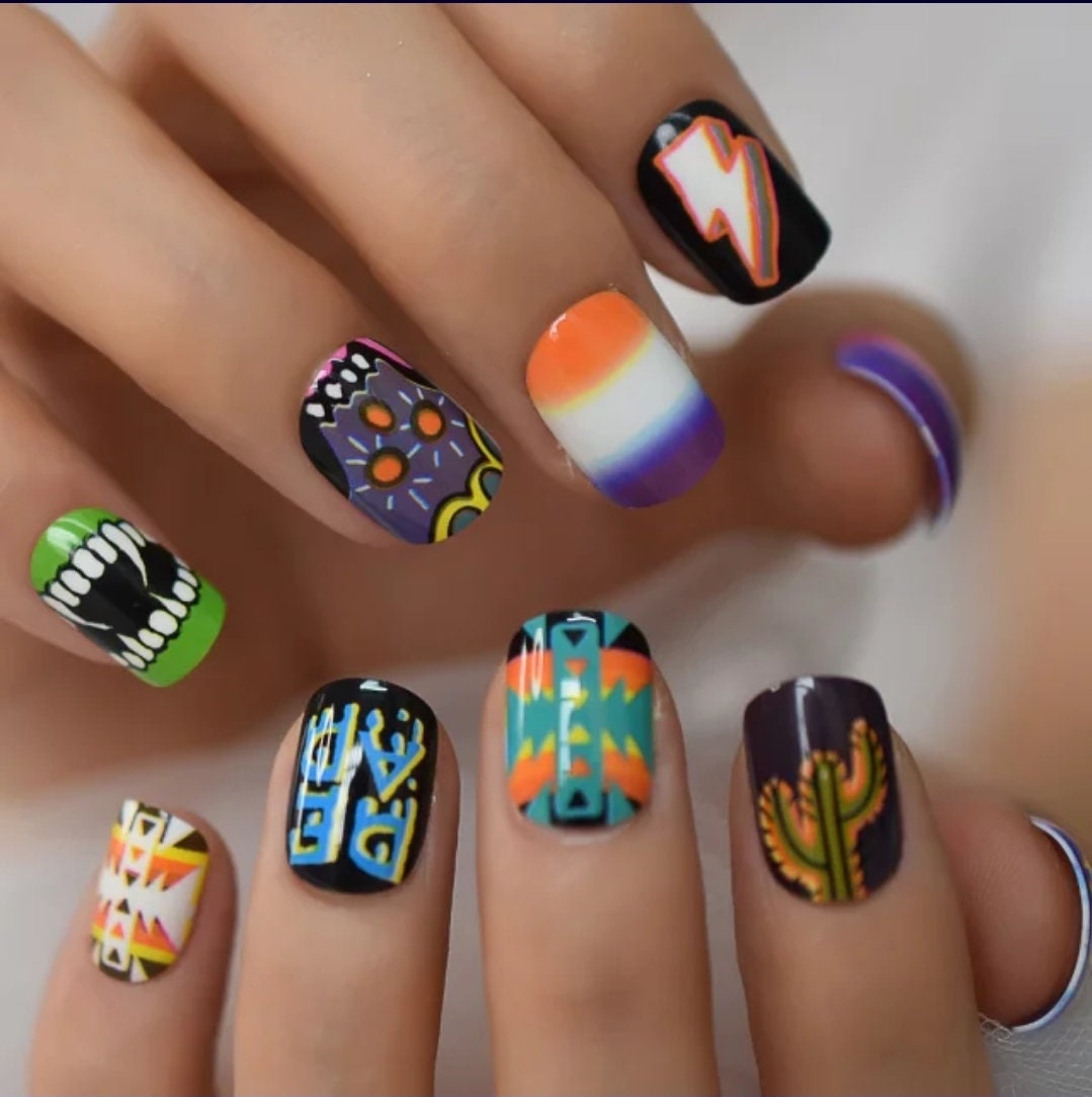 24 short press-on nails with Harajuku-inspired multi-color horror anime and comic art design – glue-on trendy nail set surethings