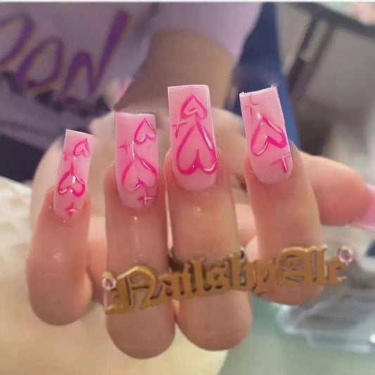 24 pink long press-on nails in coffin shape with cute Valentine heart design, bright kawaii romantic glue-on nail set surethings