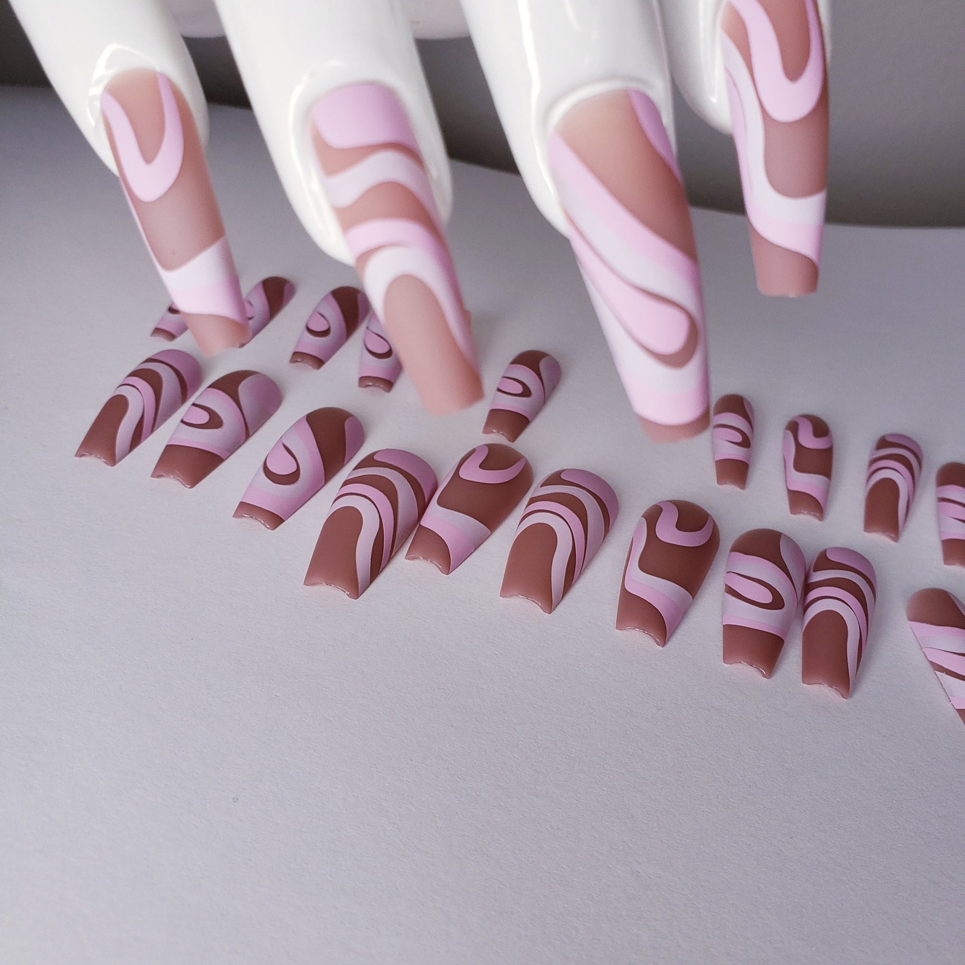 24PCS Nude Pink Swirl Long Press-On Nails – Coffin Style Glue-On Set in White, Beige & Tan for a Chic Manicure Look surethings