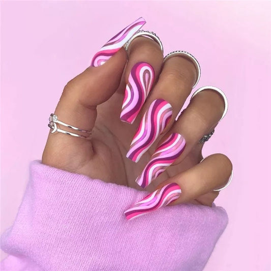 Pink and purple swirl long press on nails with matte nude coffin shape surethings
