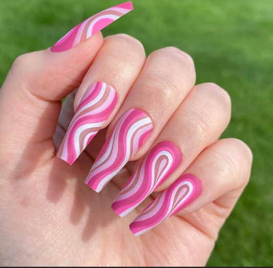 Pink and purple swirl long press on nails with matte nude coffin shape surethings