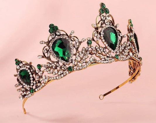 Elegant black gothic tiara with dark crystals displayed on a decorative stand-surethings