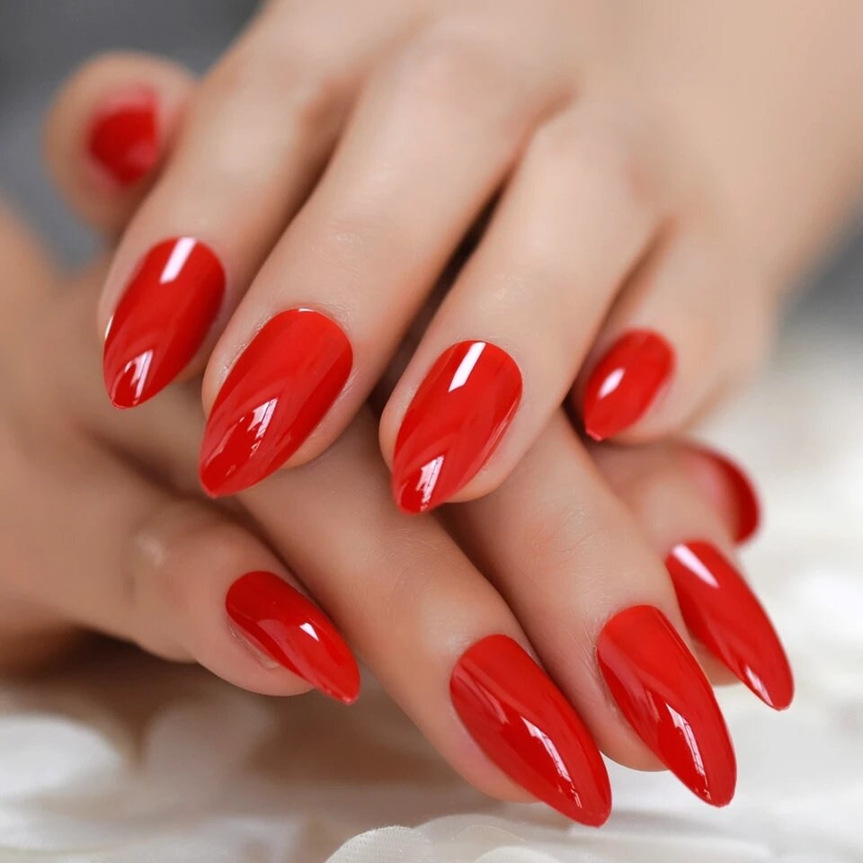 Glossy cherry red press-on nails with elegant almond shape-surethings